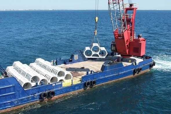 ReefMaker vessel deploying 3D-printed coastal protection reef modules offshore
