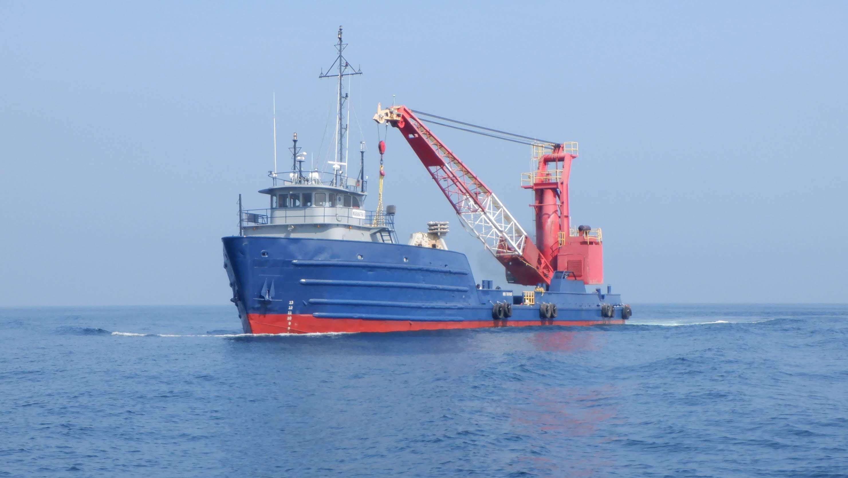 Marine construction vessel operating a crane offshore