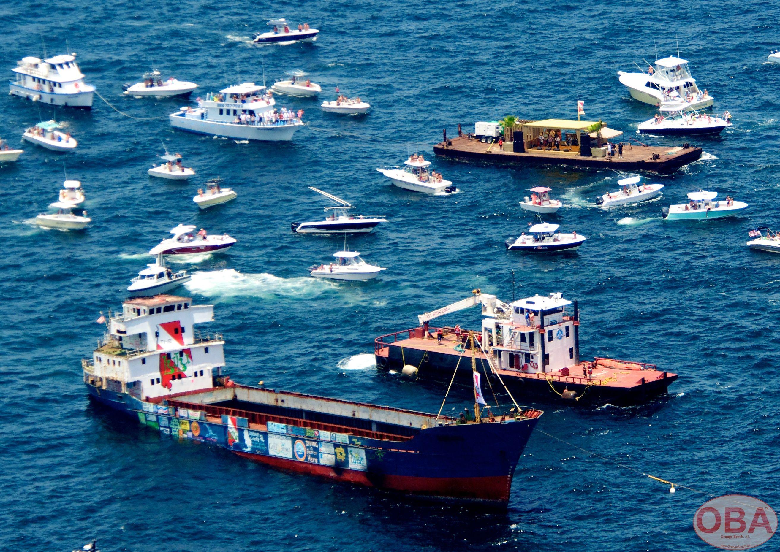 LuLu vessel surrounded by support boats before the sinking operation