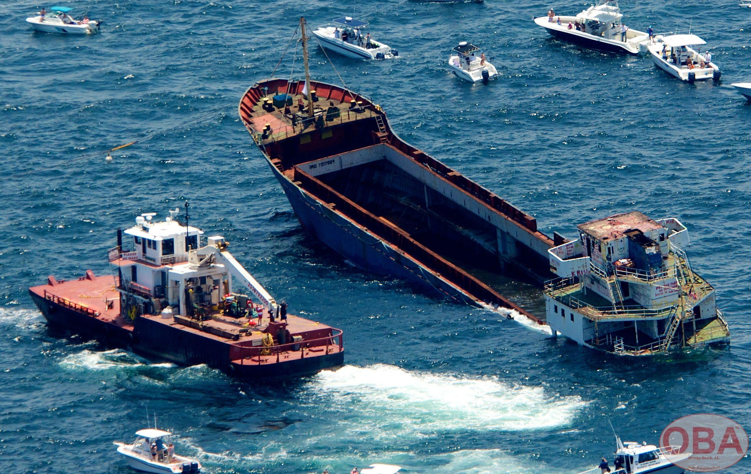 Bow of the LuLu rising above the water during the controlled sinking